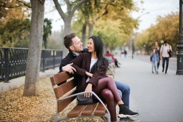Couple sitting close together